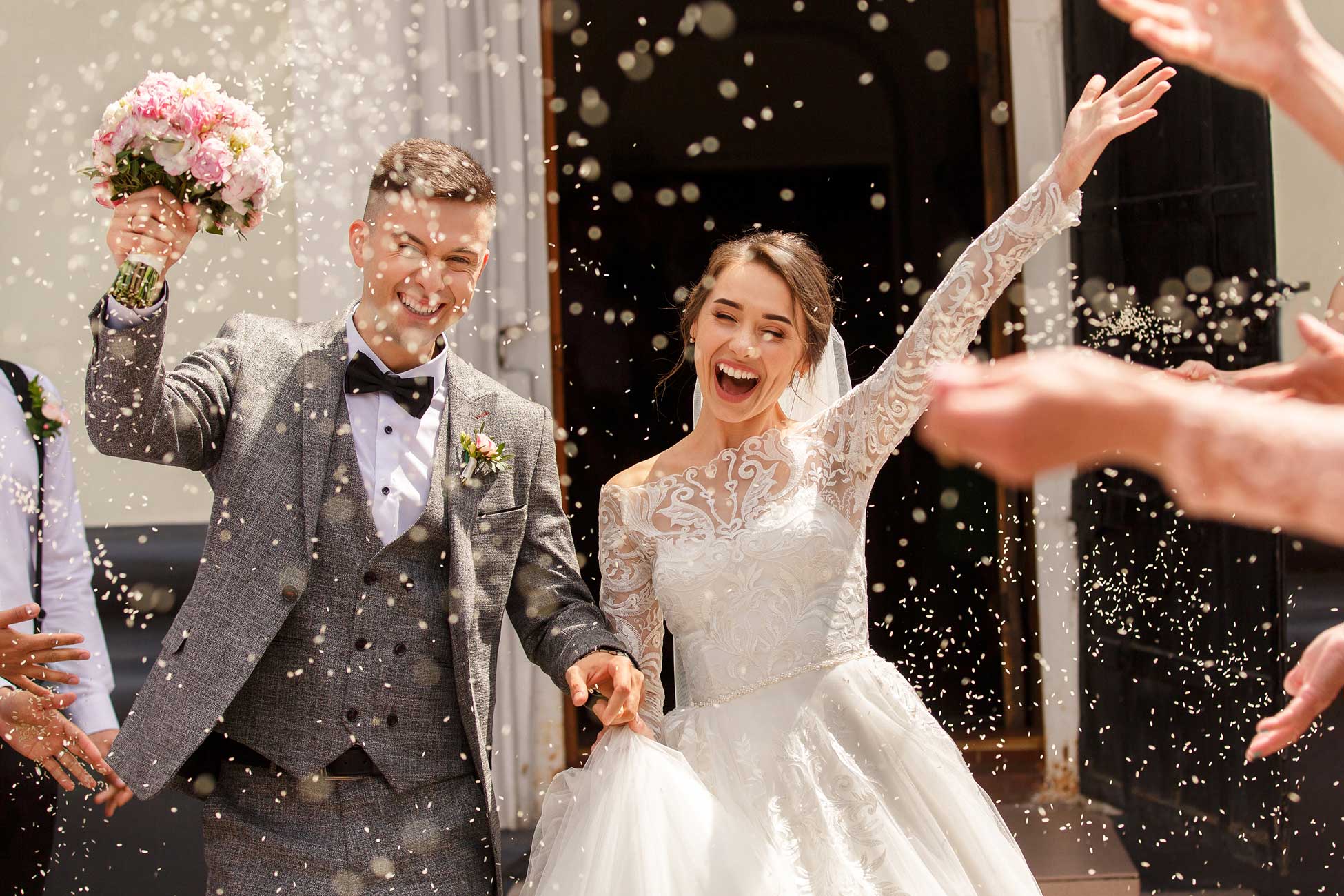 couple just married with confetti for wedding videography